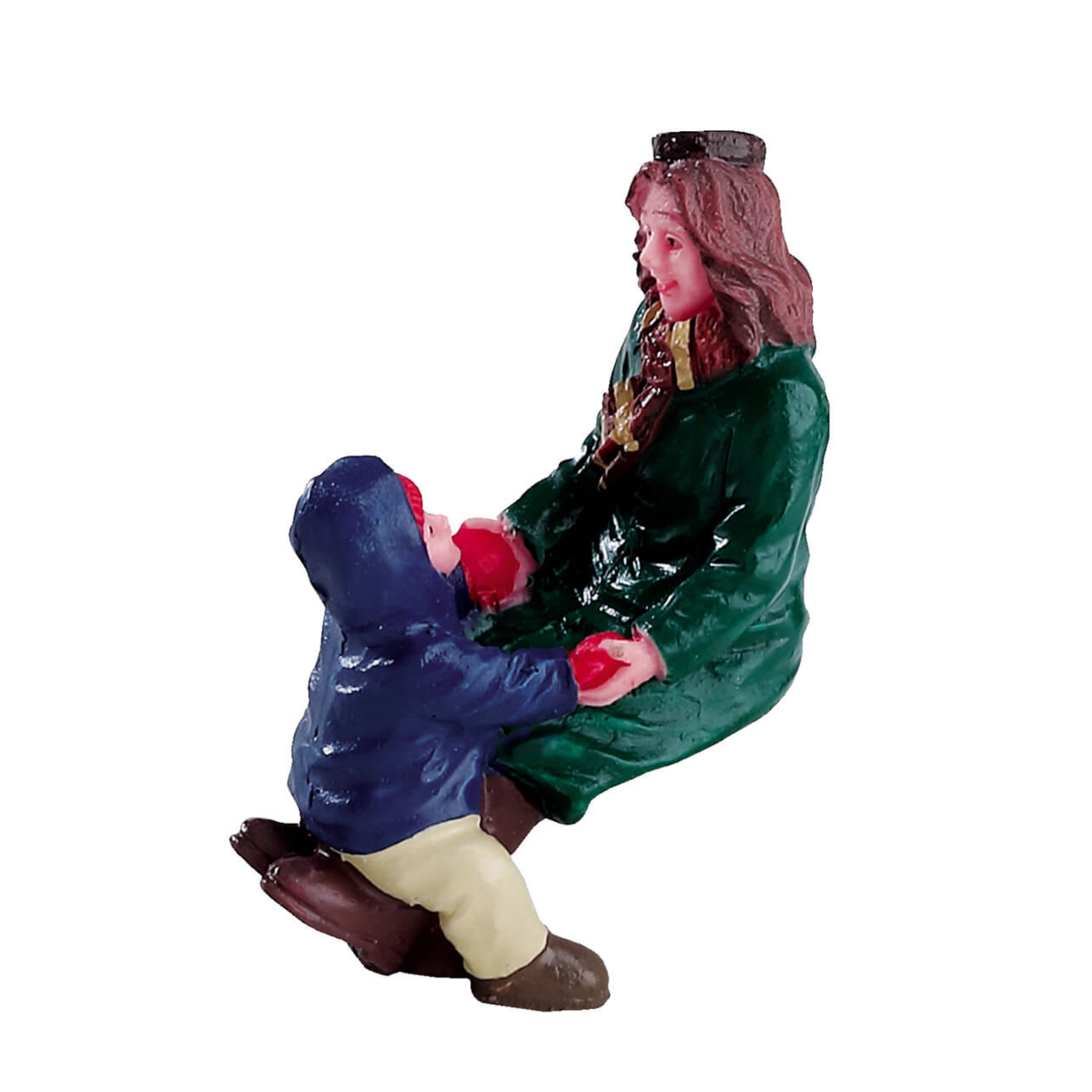 Figurine of a woman in a green dress holding a child in a blue coat on a white background