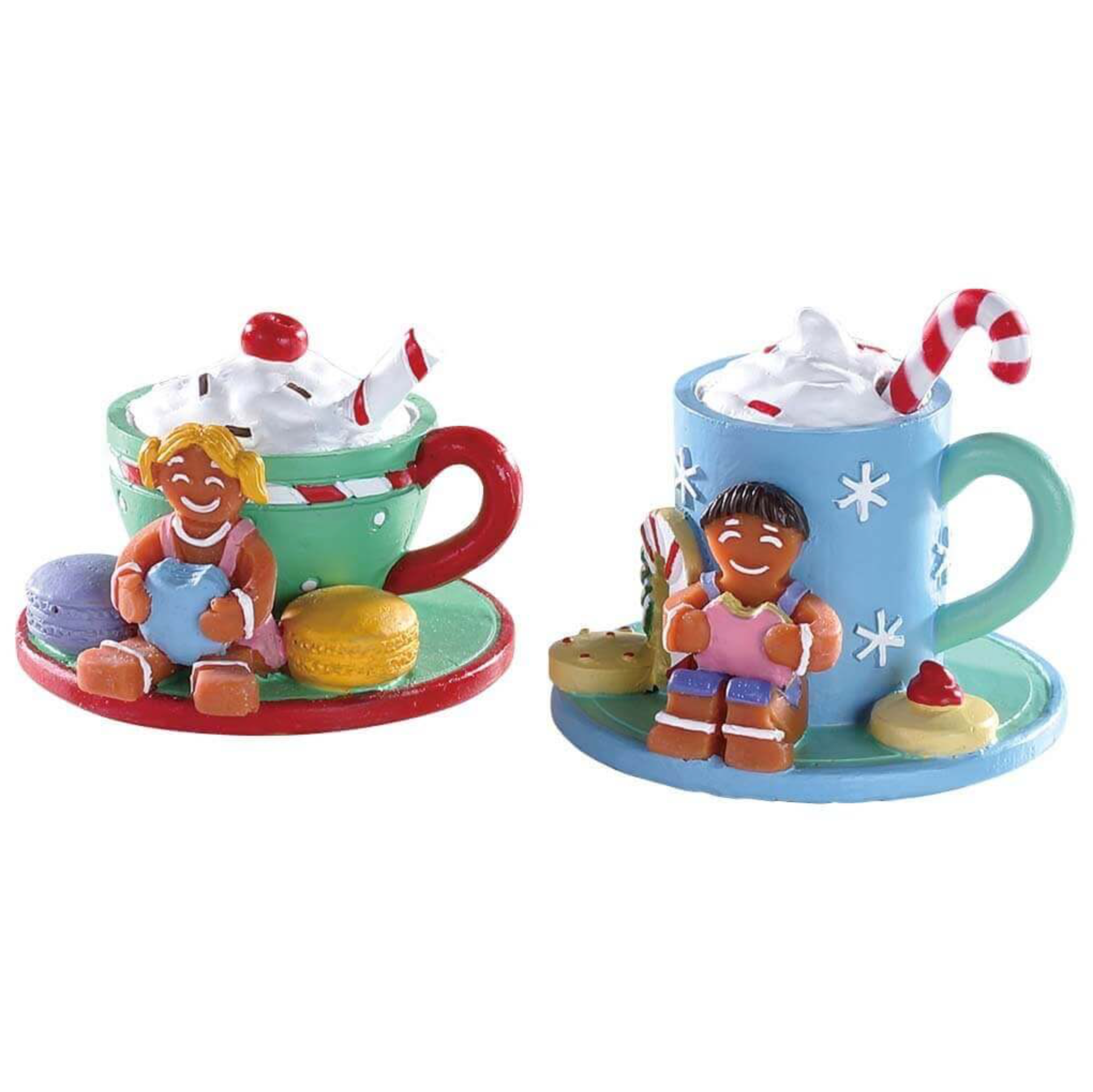 Two colorful ceramic Sugar and Spice mugs figurines from with gingerbread men characters on a white background