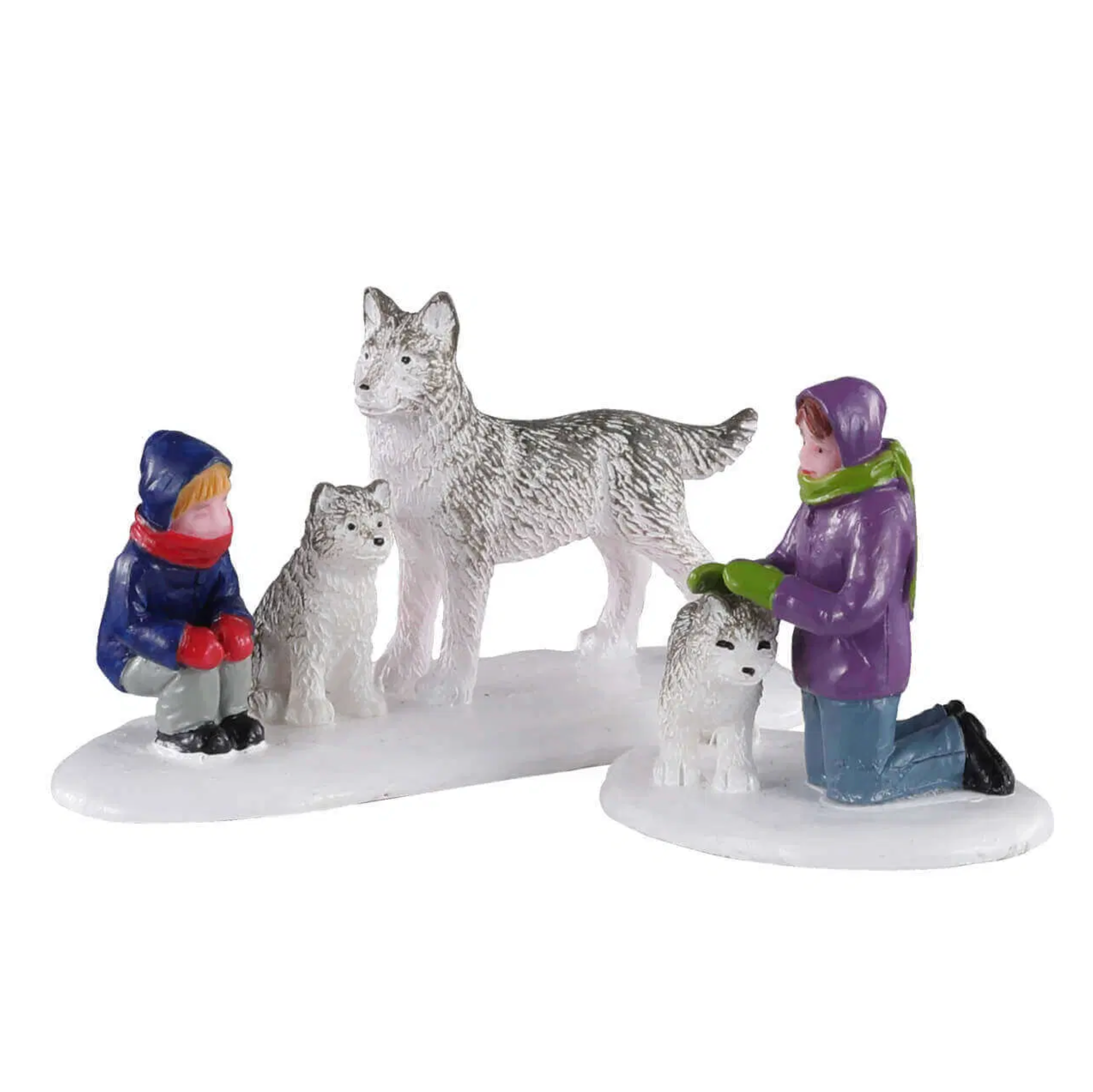Figurines of people and wolves on a white background