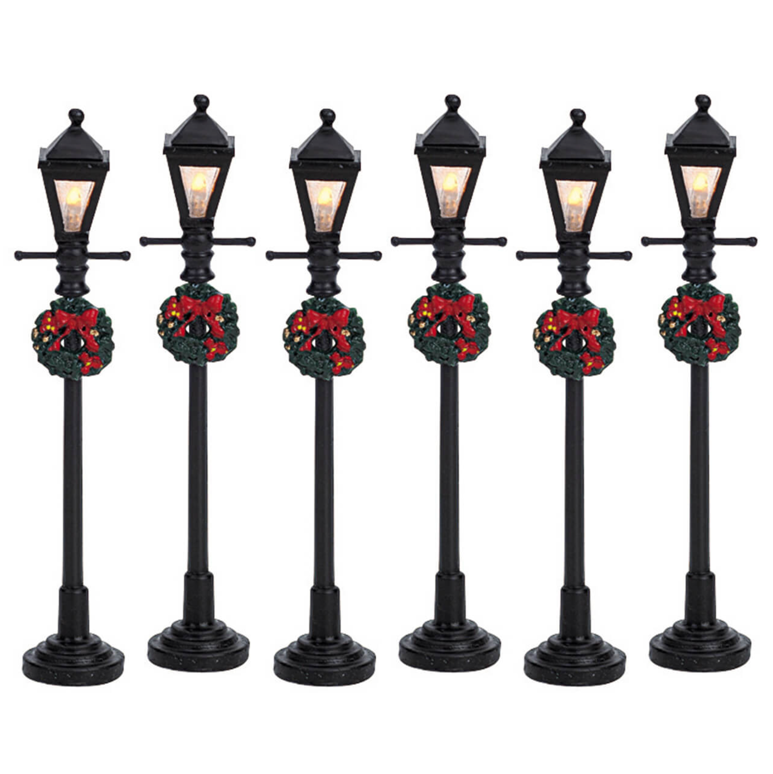 Set of six Lemax decorative street lamps with wreaths and bows on a white background