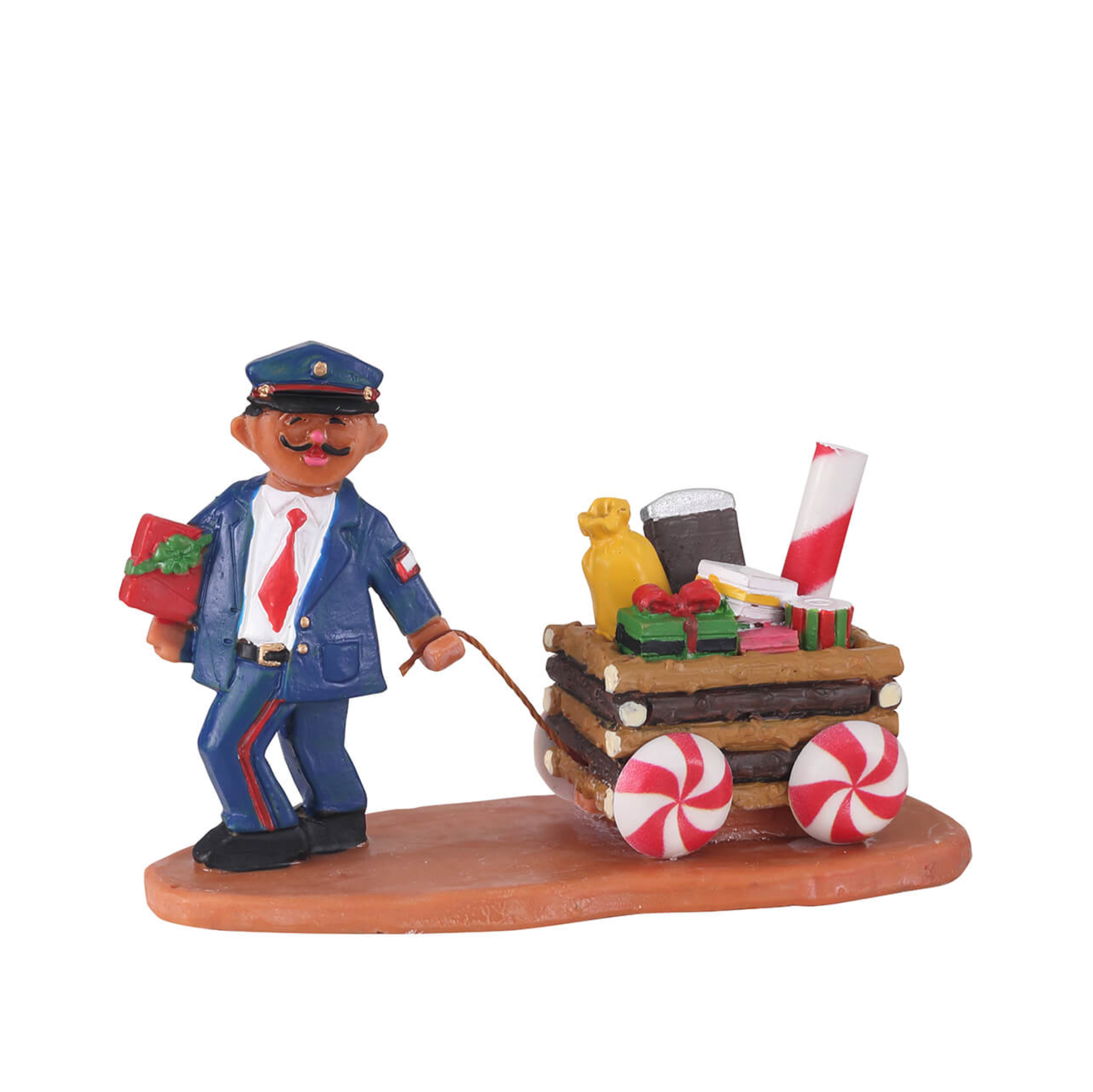 Figurine of a Lemax postman in a blue uniform pulling a candy cart on a white background