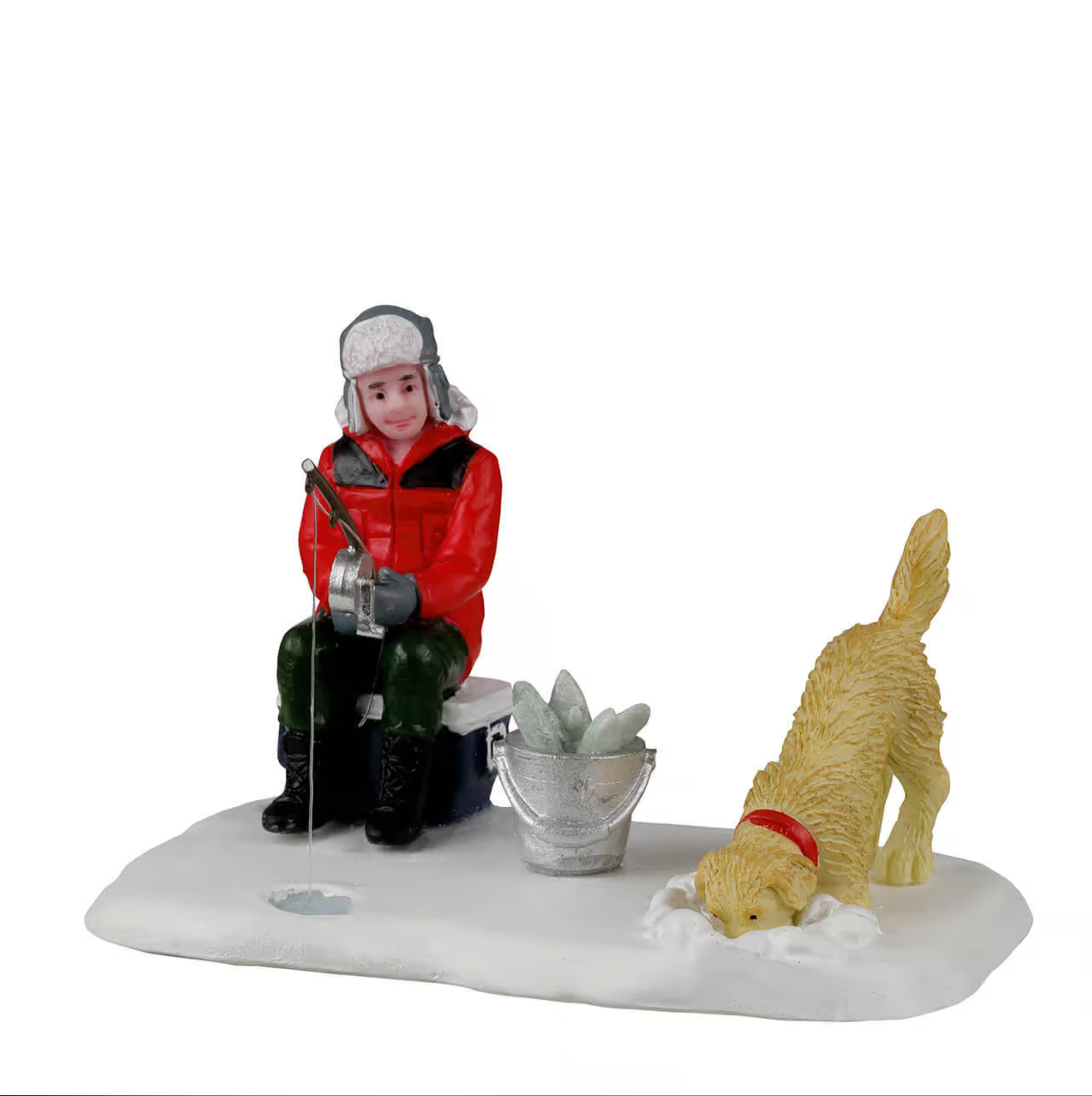 Figurine of a person ice fishing with a dog on a white background