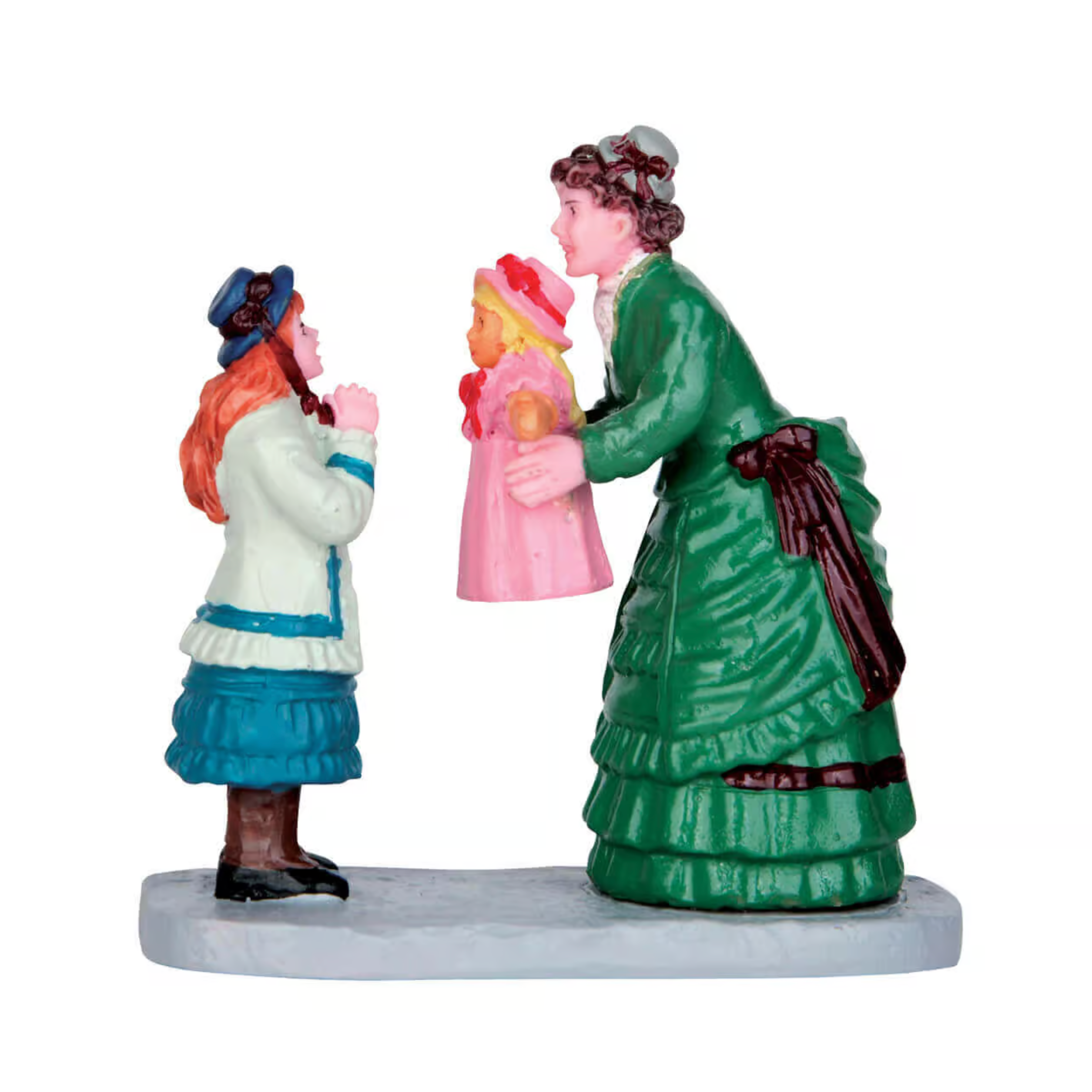 Figurine of a woman giving a doll to a child in vintage clothing on a white background