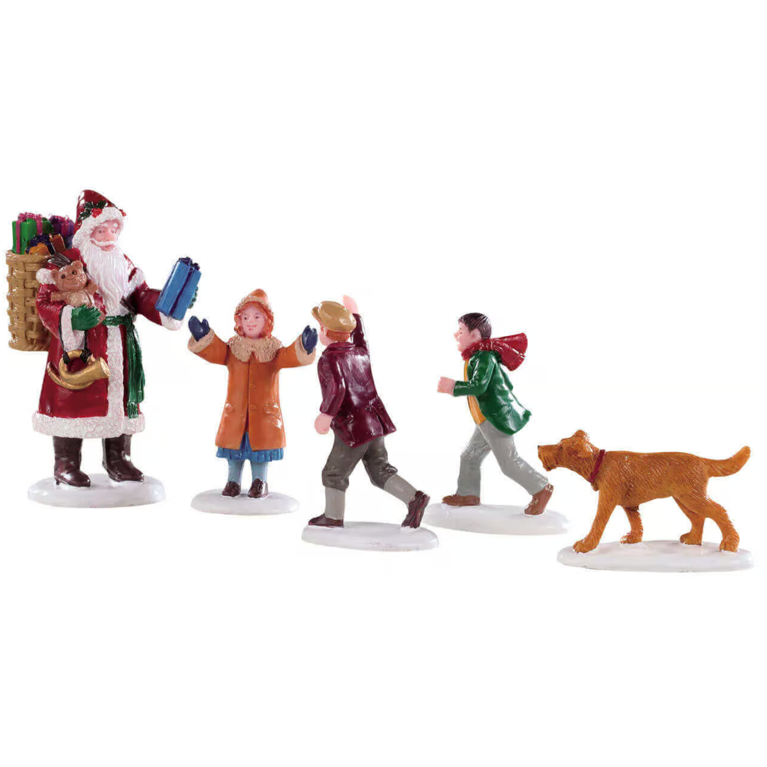 Set of Christmas-themed figurines with Santa Claus and children on a white background