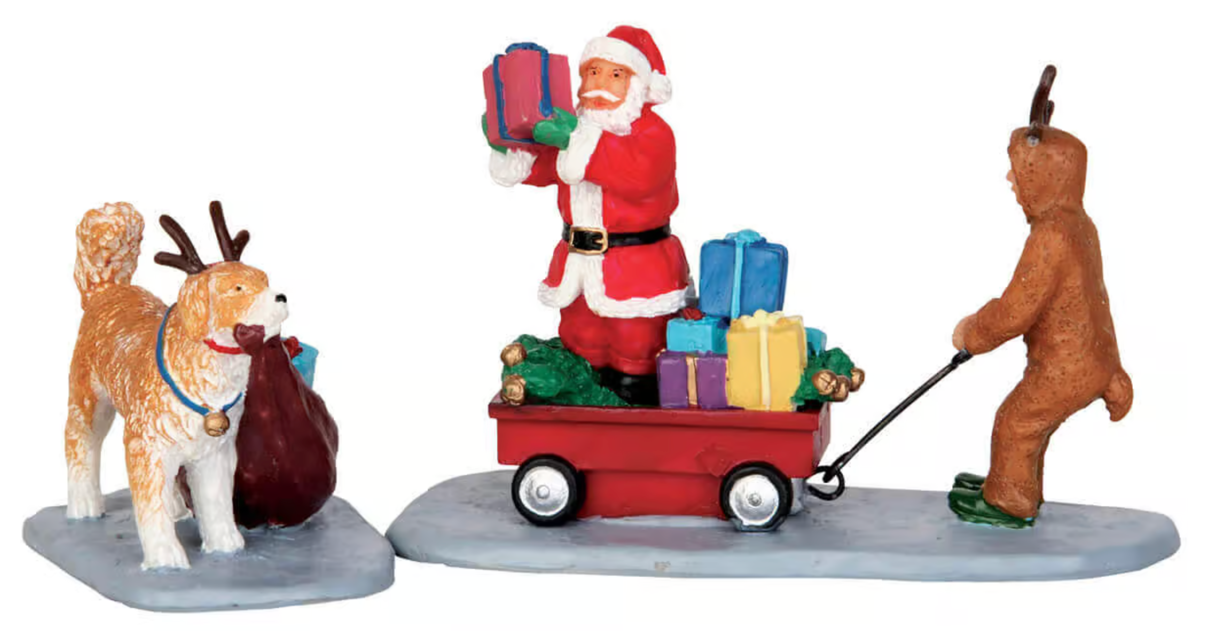 Decorative figurine set featuring Santa Claus with reindeer and dog on a white background