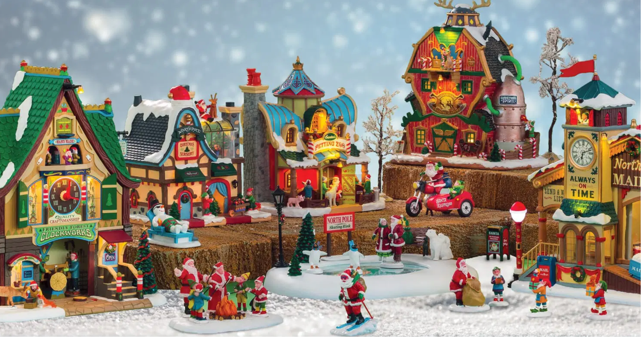 Christmas village scene with colorful houses and Santa Claus figures on a snowy background