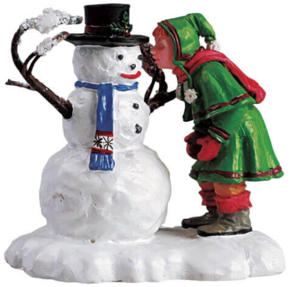 Decorative Lemax figurine of a person in winter clothing kissing a snowman on a white background
