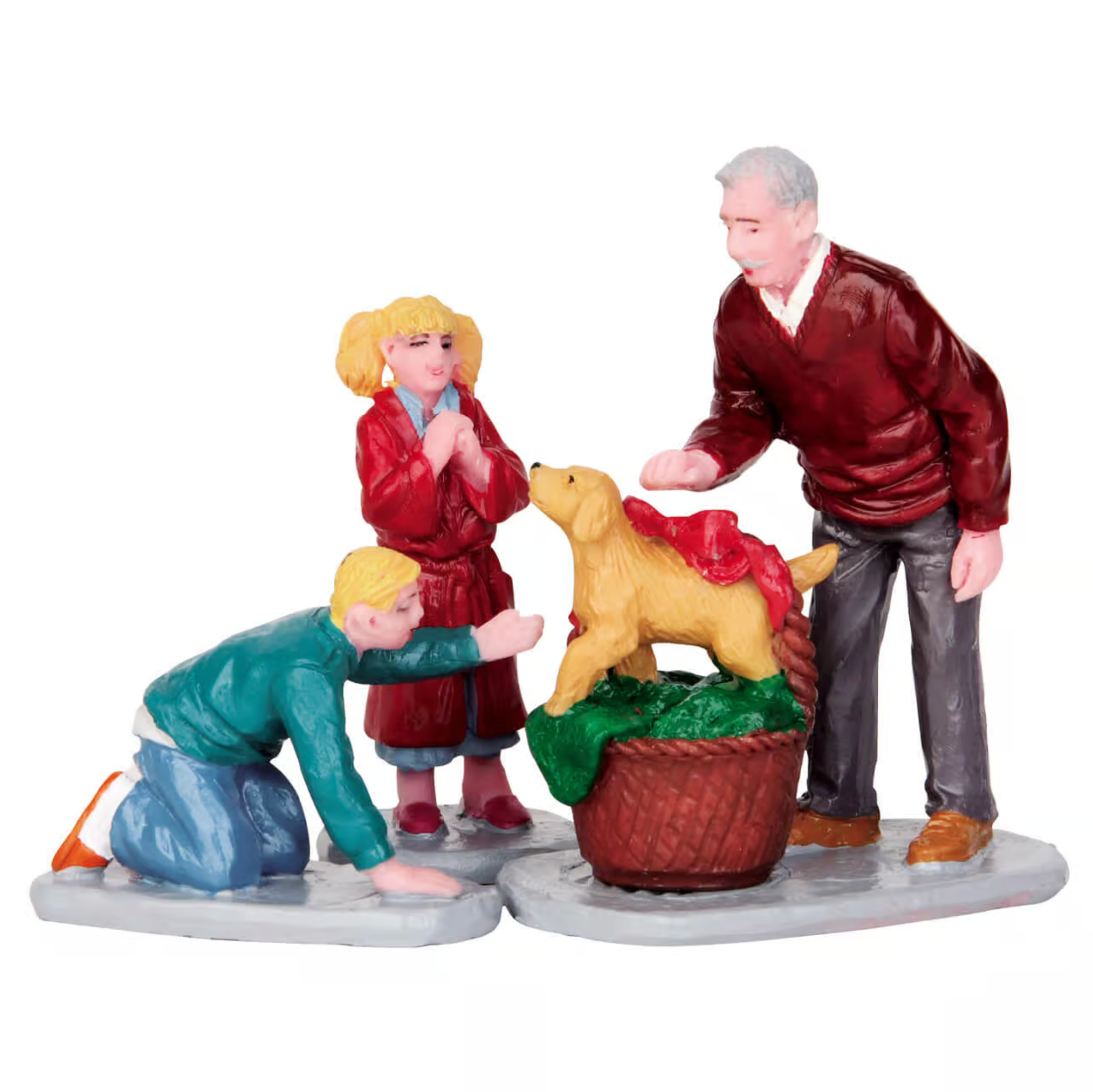 Figurine set of a family with a dog on a white background