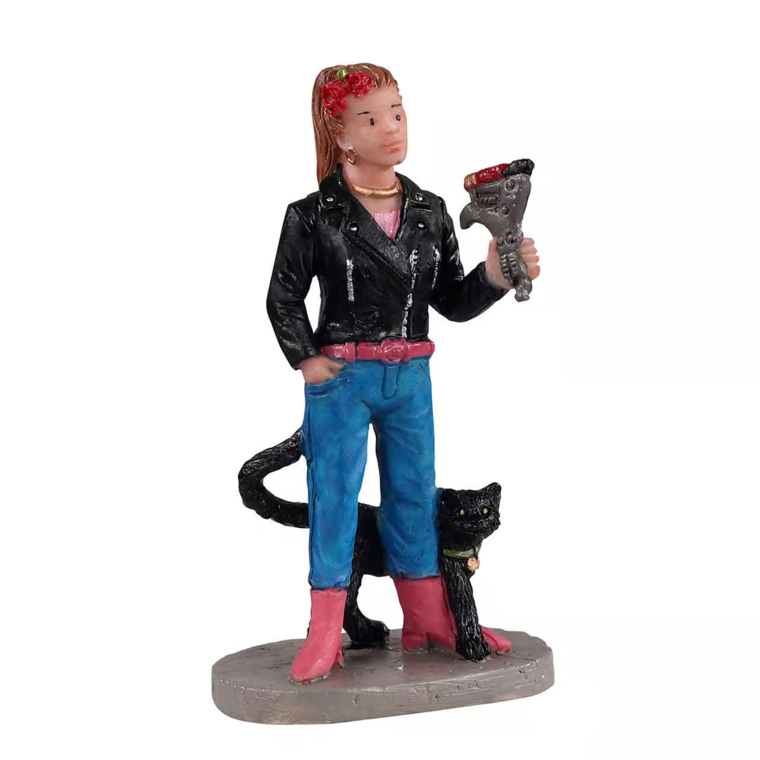 Figurine of a person in a black leather jacket holding a weapon, with a cat on a white background