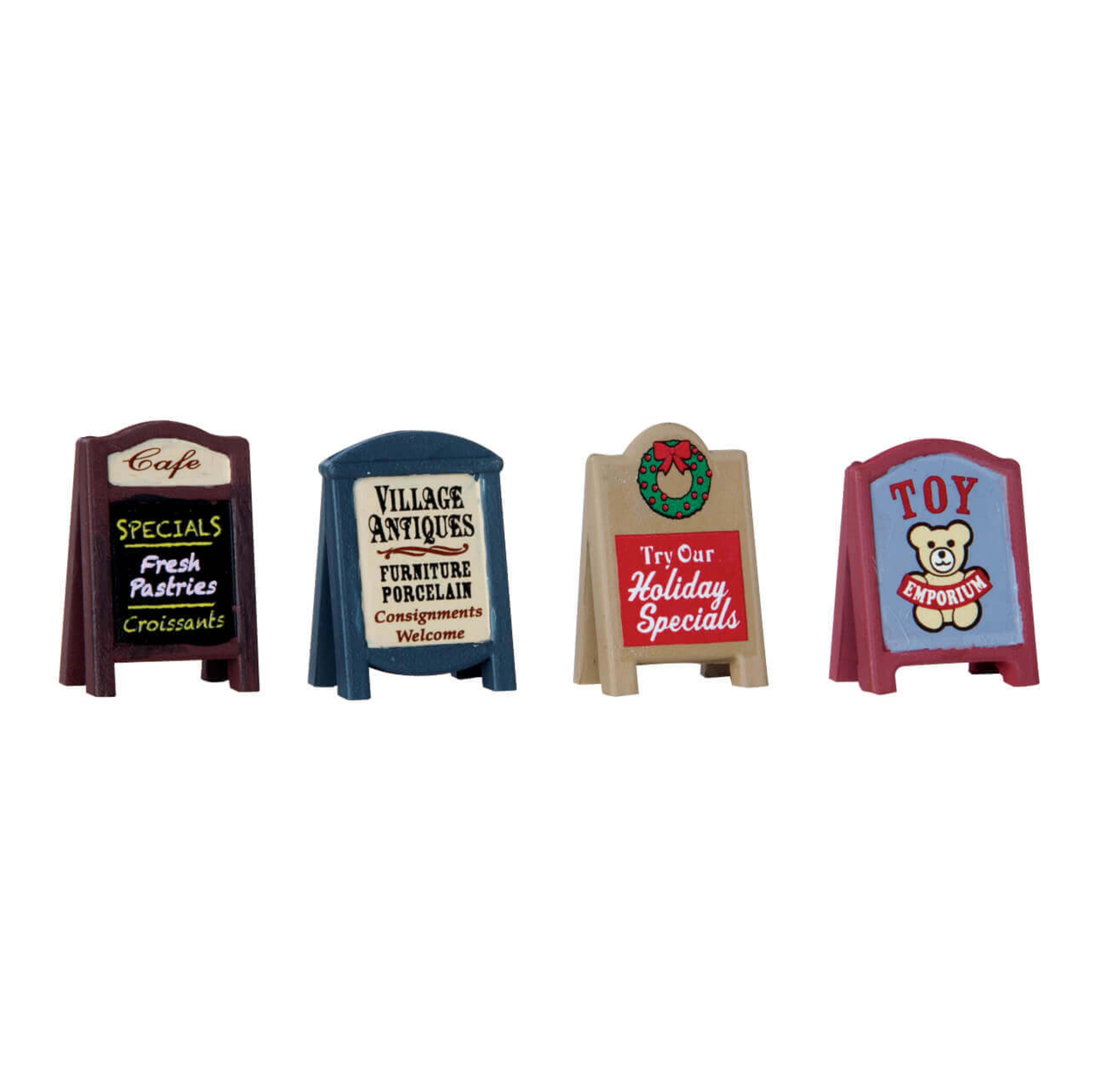 Set of miniature Lemax Christmas signboards with different text on a white background